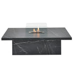 Acantha Castellon bioethanol coffee table in black marble effect with glass guards and the burner lit