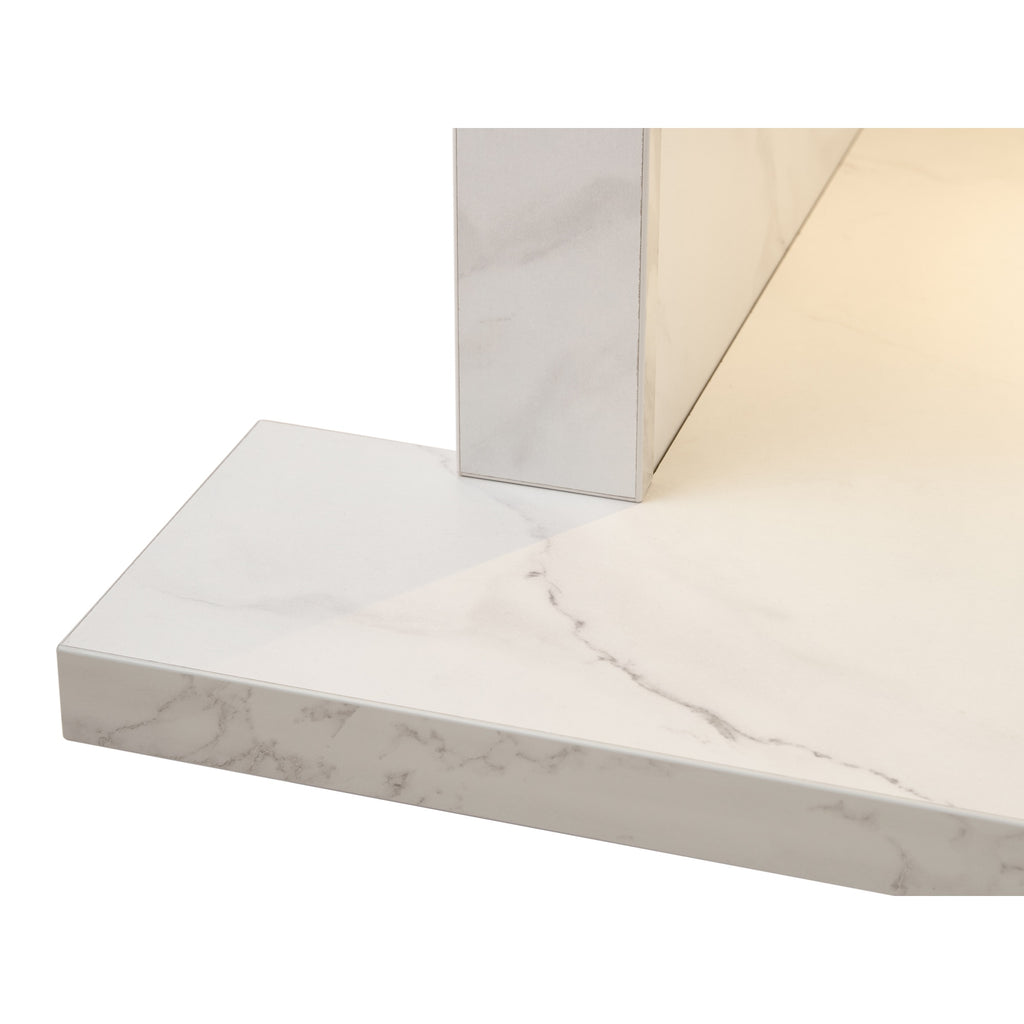Close up of the hearth corner of the Acantha chamber kit in white marble effect