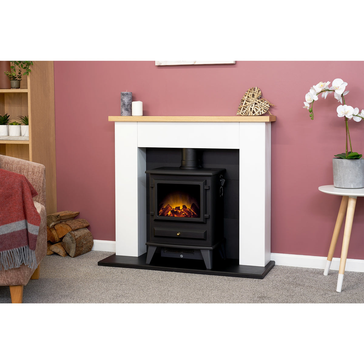 Adam Chester fireplace suite with Hudson electric stove in a living room