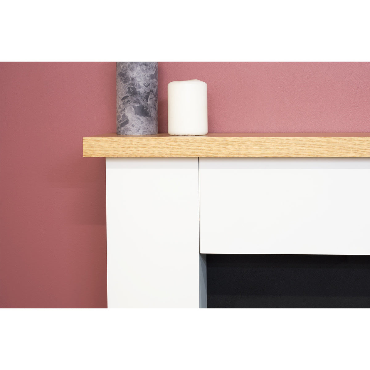 Close-up of the oak finish shelf on the Adam Chester pure white fireplace