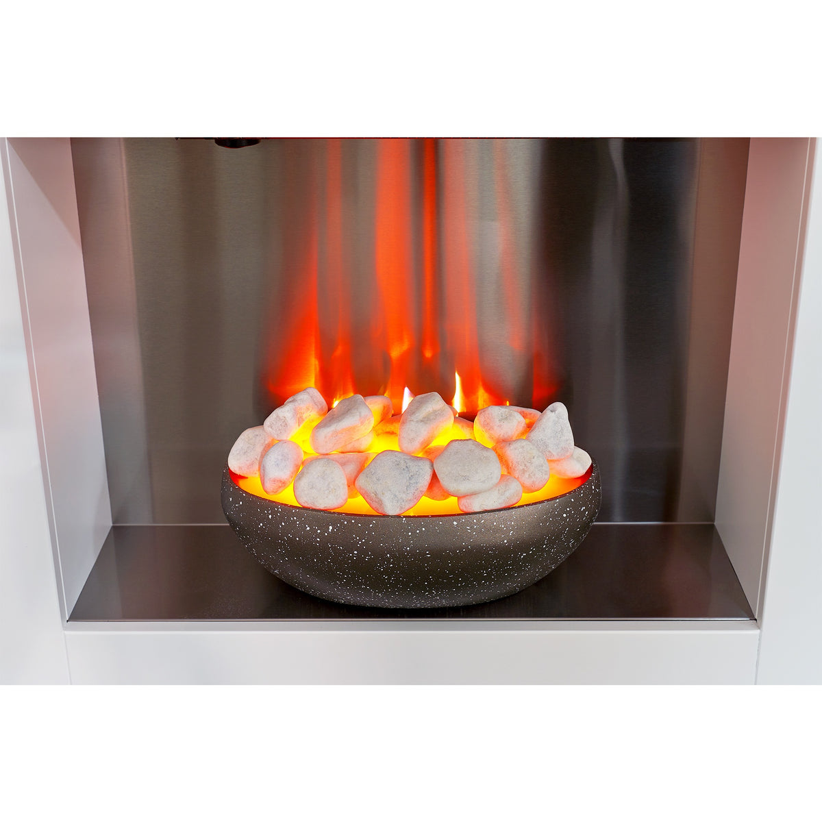 Adam Cubist fire bowl with white pebbles and LED glow, close up