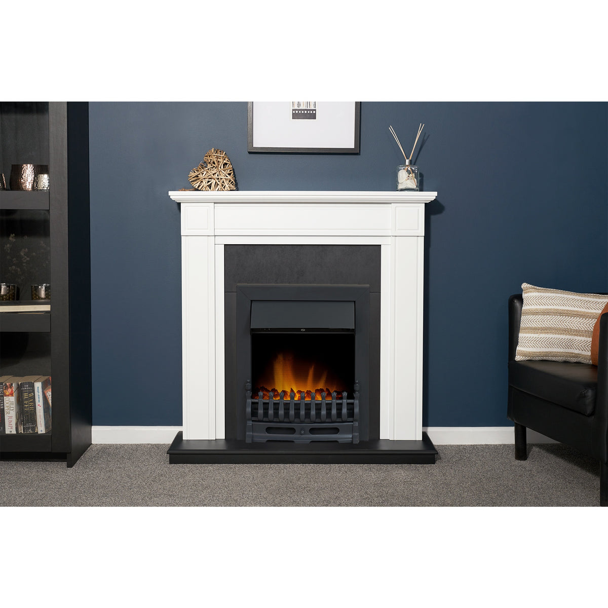 Adam Georgian fireplace suite with Blenheim electric fire against a blue wall
