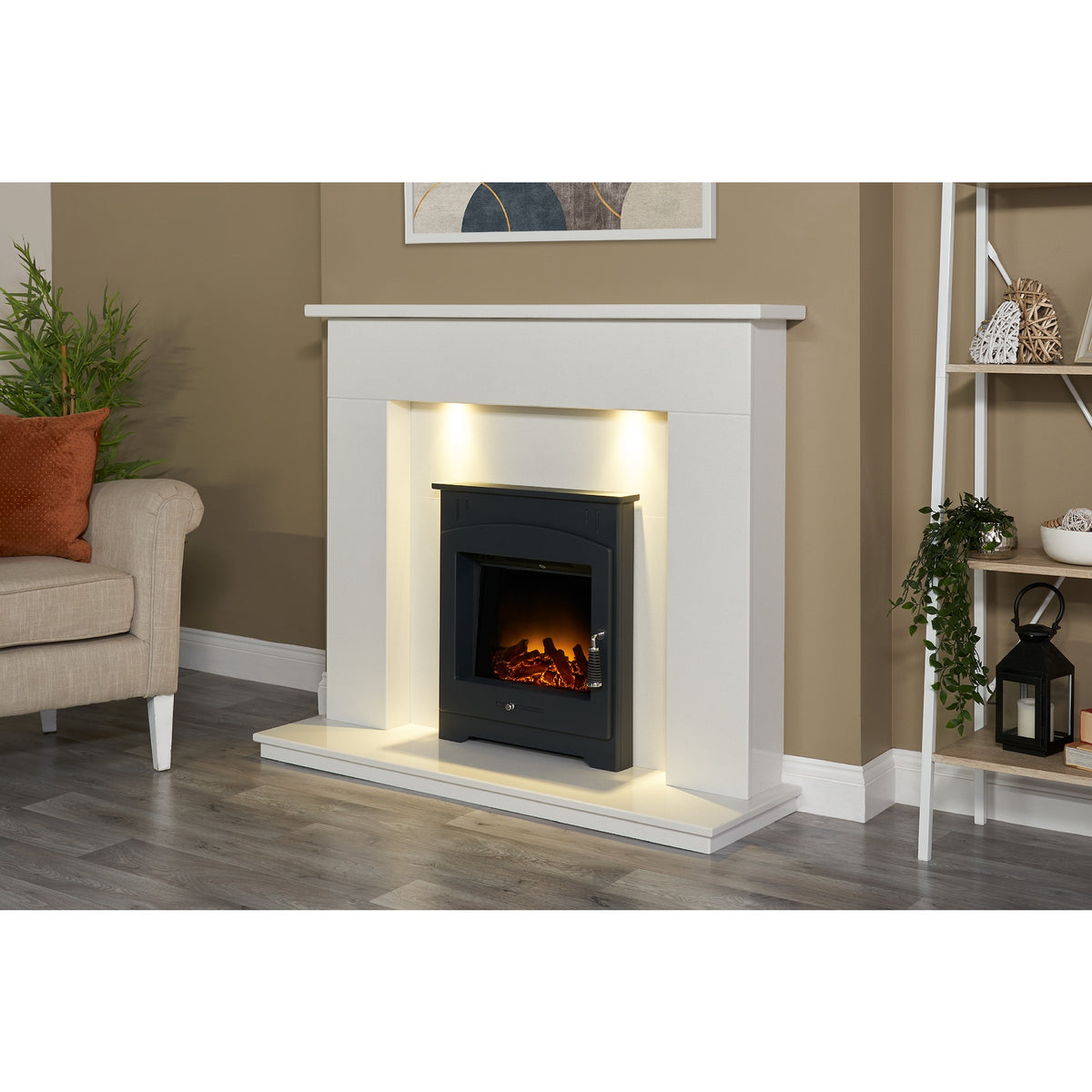 Adam Holston electric inset stove in black shown fitted in a white fireplace surround