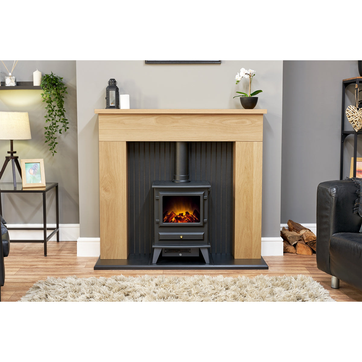 Adam Innsbruck fireplace with Hudson electric stove in a living room