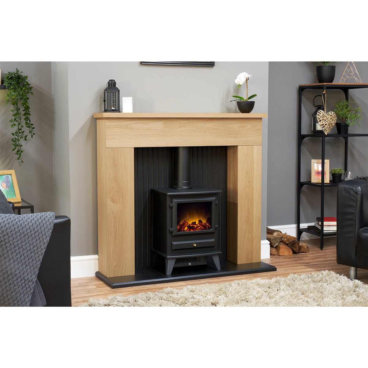 Adam Innsbruck oak fireplace and black Hudson stove, room setting