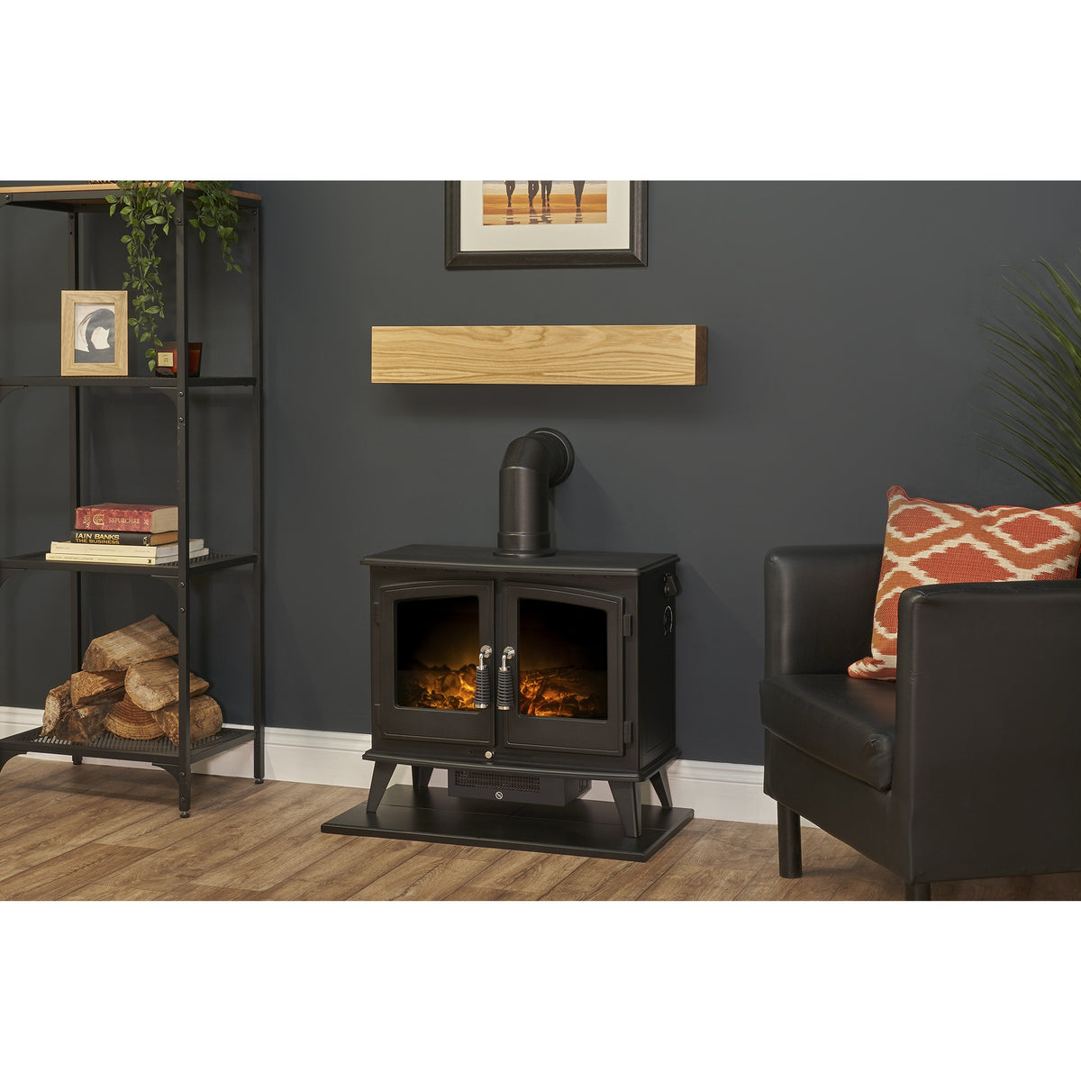 Adam oak effect beam, black hearth and angled stove pipe with Woodhouse electric stove in black