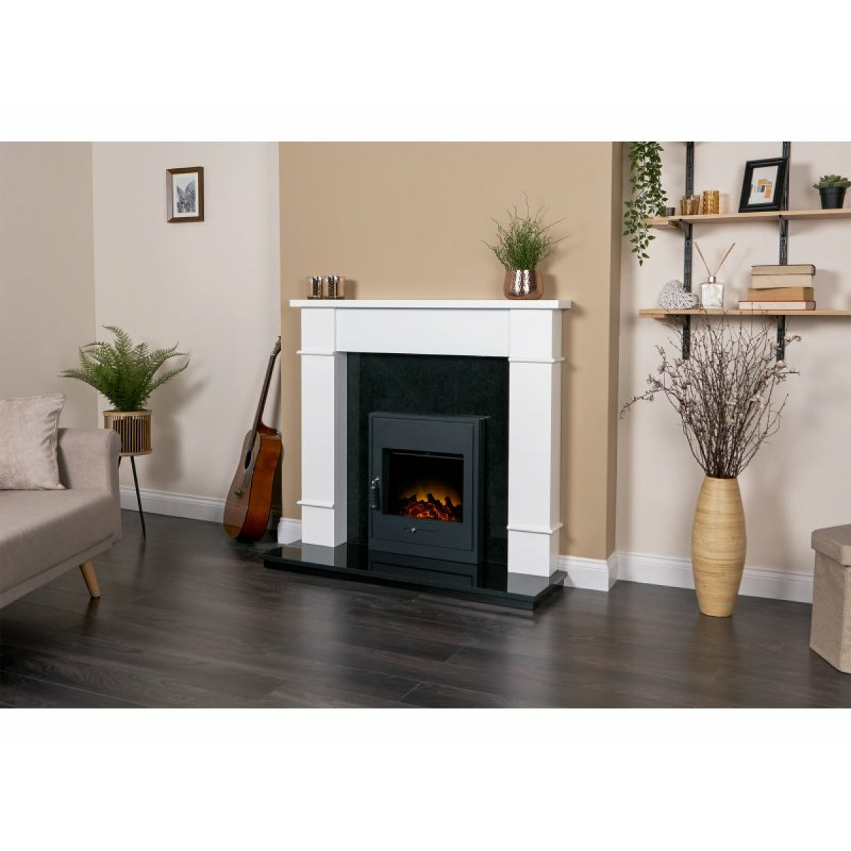Adam Oslo electric inset stove in black shown fitted in a fireplace