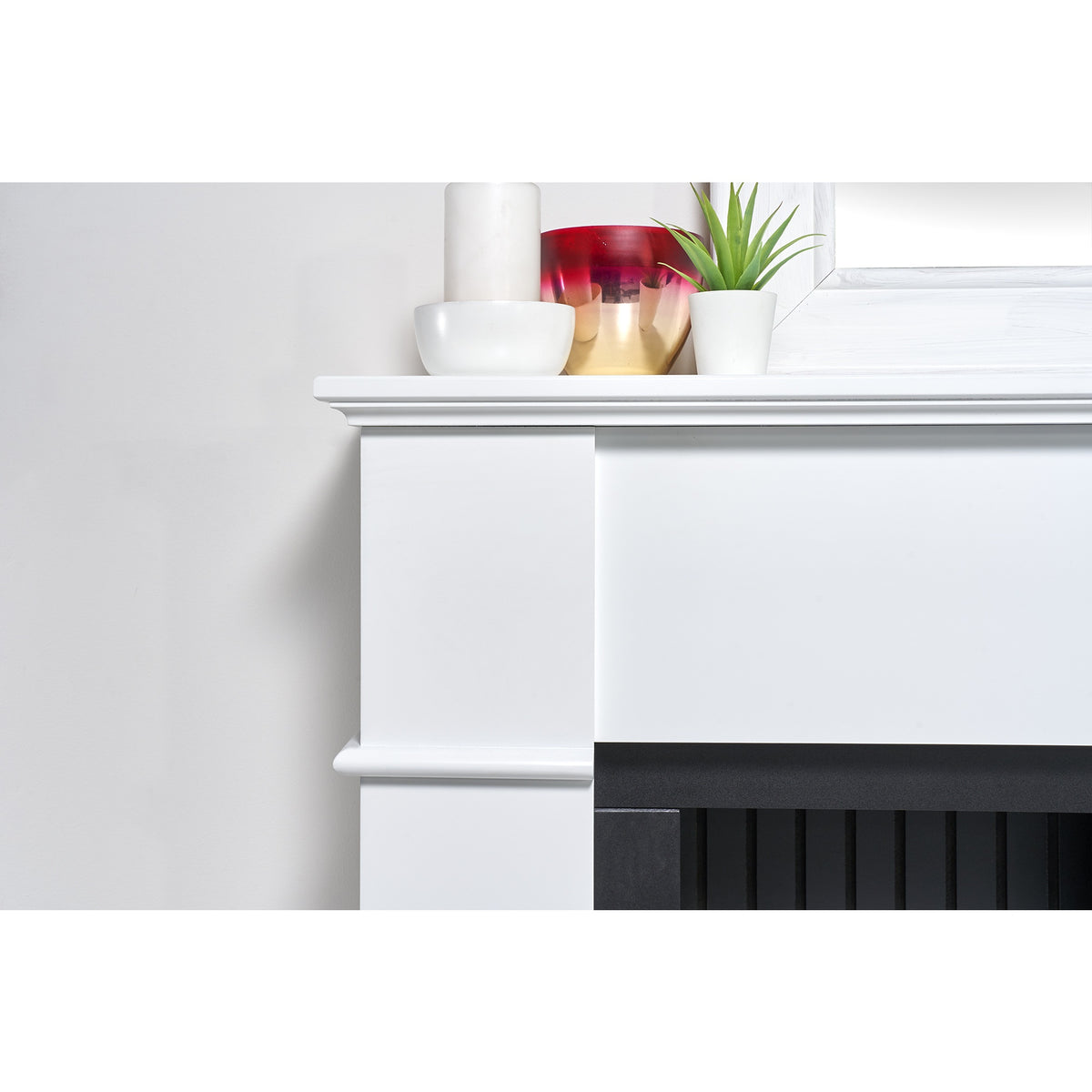 Close-up of the mantel on the Adam Oxford pure white fireplace