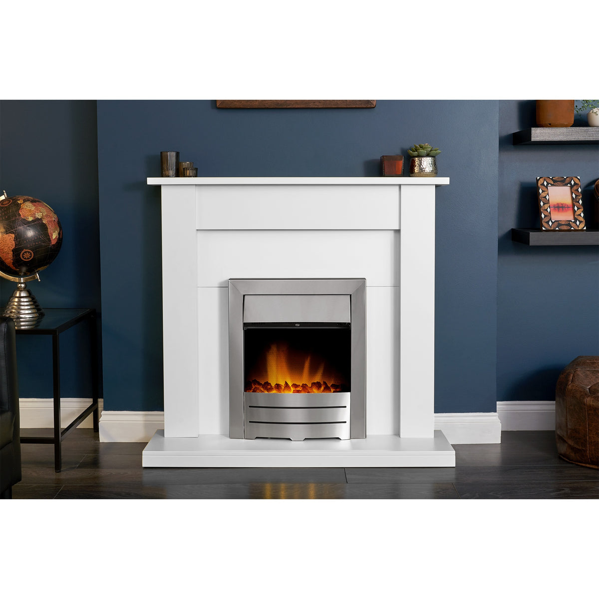 Adam Sutton pure white fireplace suite with Colorado fire in a living room