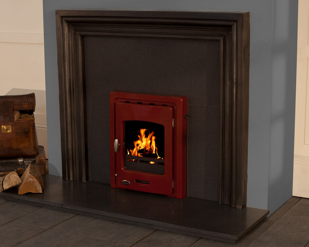 Carron black granite 3 piece back panel behind an inset stove in a fire surround