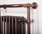 Carron Broughton towel rail in brushed bronze with painted cast iron sections, detail