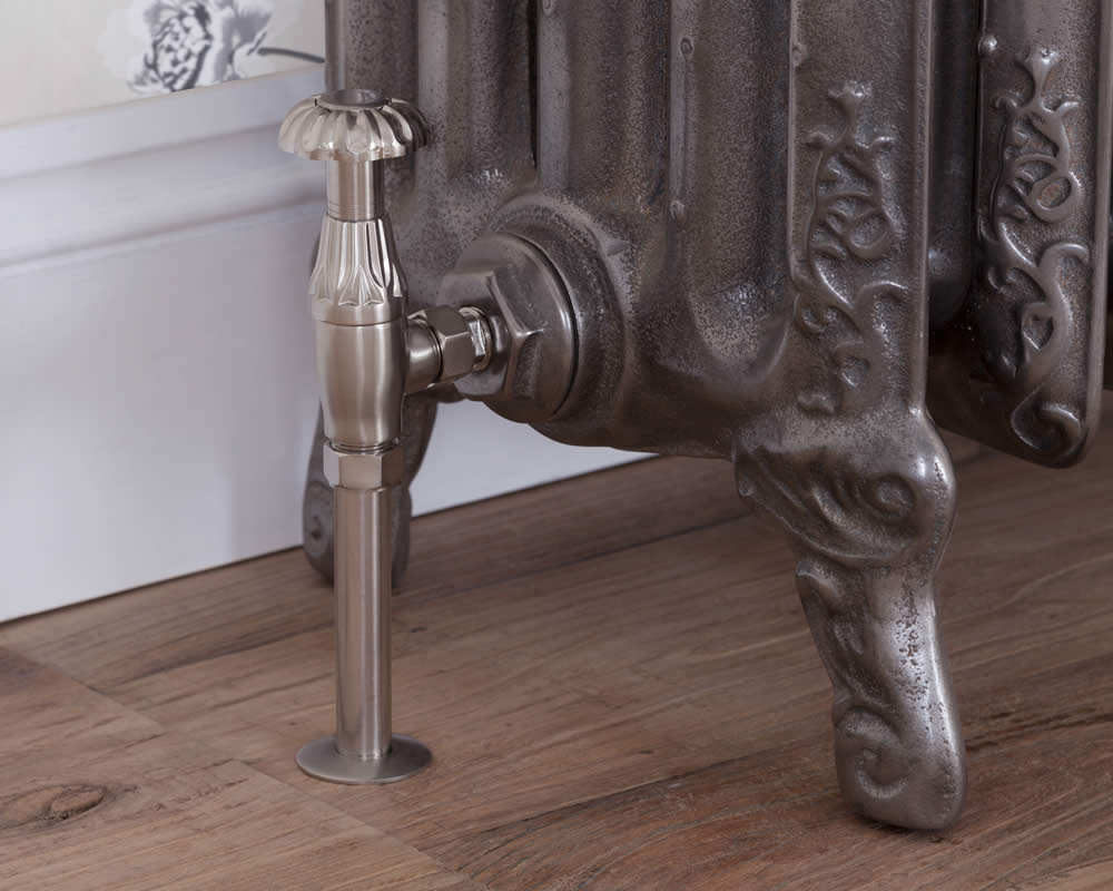 Carron Crocus manual valve in satin nickel installed on a radiator