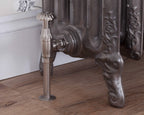 Carron Crocus manual valve in satin nickel installed on a radiator