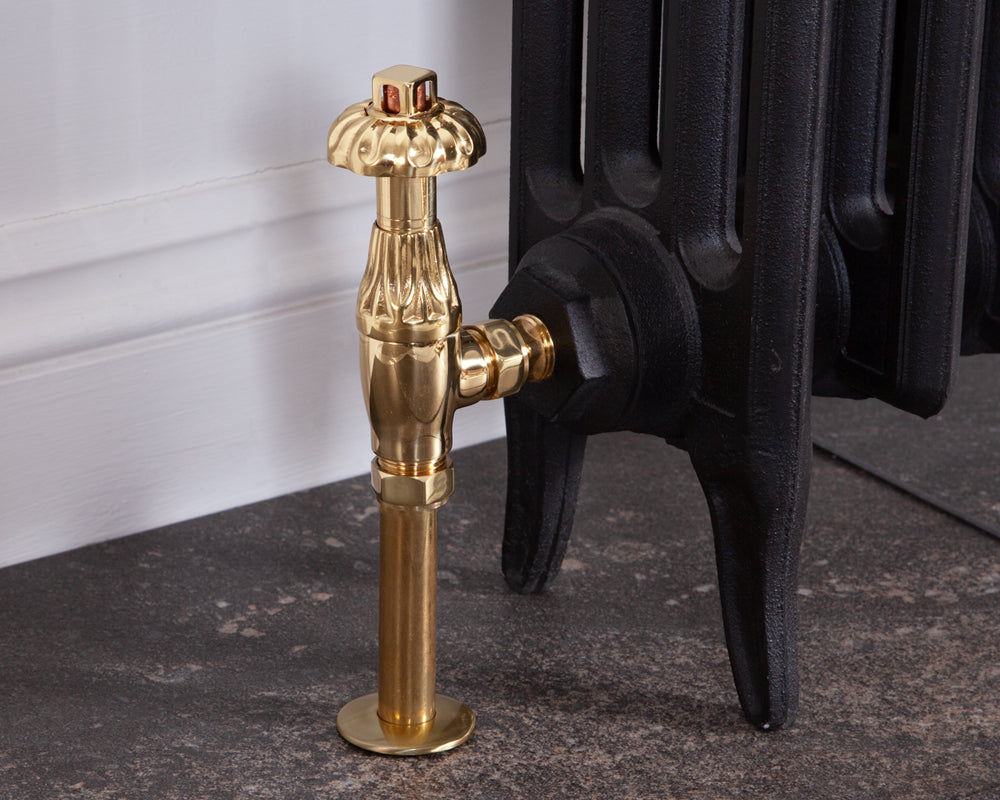 Carron Crocus thermostatic valve in brass installed on a radiator