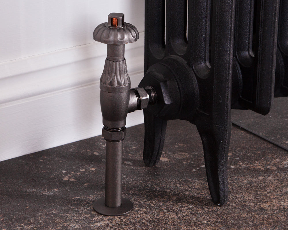 Carron Crocus thermostatic valve in pewter installed on a radiator