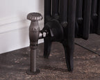 Carron Crocus manual valve in pewter installed on a radiator