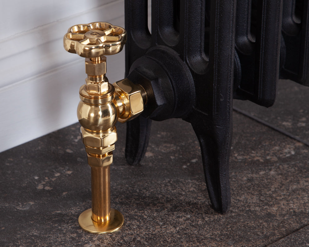 Carron Daisy wheel valve set in brass installed on a radiator