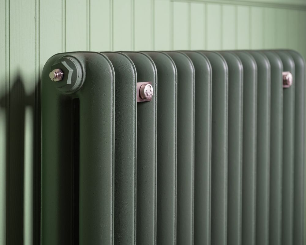 Carron Duchess 2 Column cast iron radiator, Farrow and Ball dyrehaven close up
