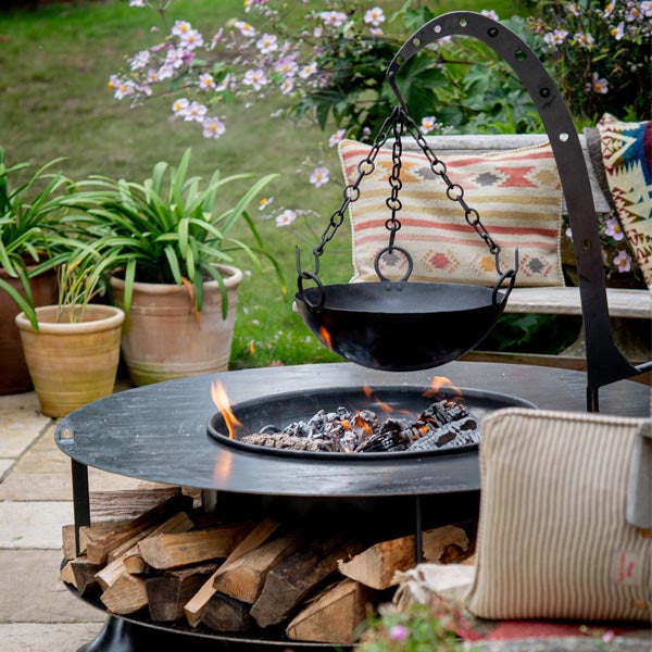 Flat Ring of Logs 120 with a hanging arm and cooking bowl (accessories sold separately)