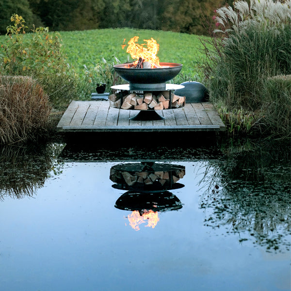 Ring of Logs 90 fire pit beside water