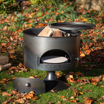 Pete's Oven 70 with its swing arm BBQ rack and a pizza stone