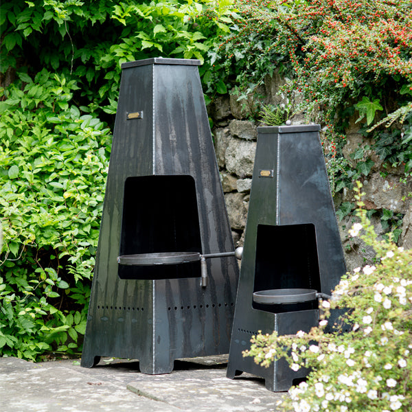 Piazza and Piazza Junior chimineas side by side on a patio