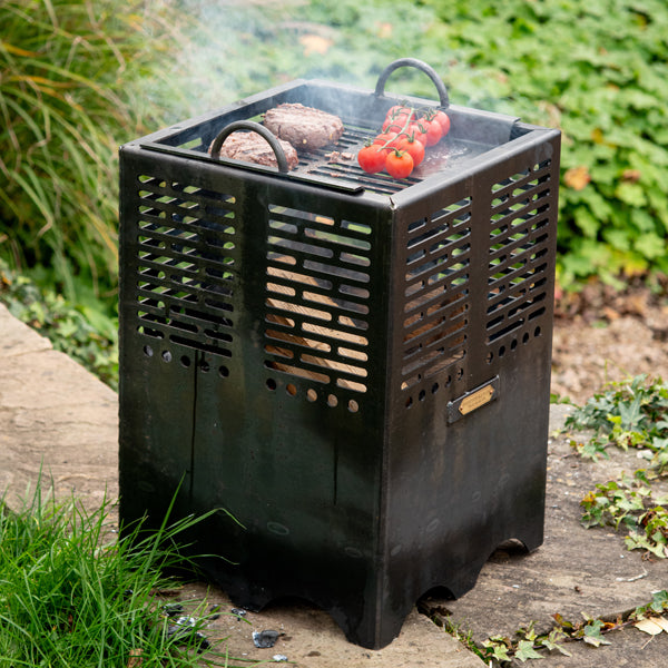 Mini Hex fire pit with its removable BBQ grill in place