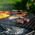 Food cooking over the Portobello fire pit