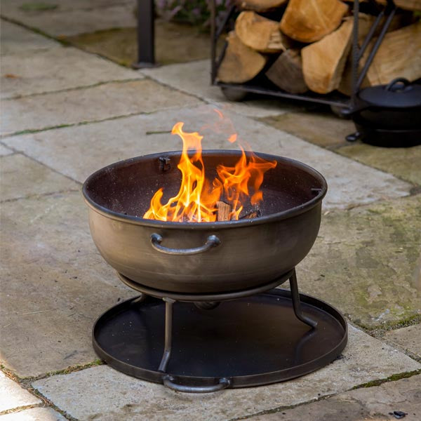 Camping pit lit on a patio