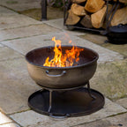 Camping pit lit on a patio
