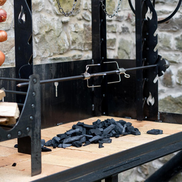 Close-up of the Asado Maximo rotisserie spit