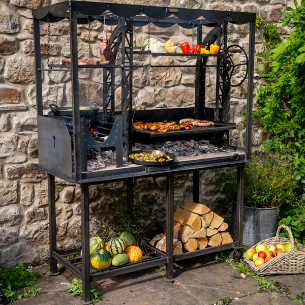 Asado Maximo with the rotisserie removed and food on the grill