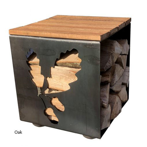 Log store seat with an oak leaf design, filled with logs