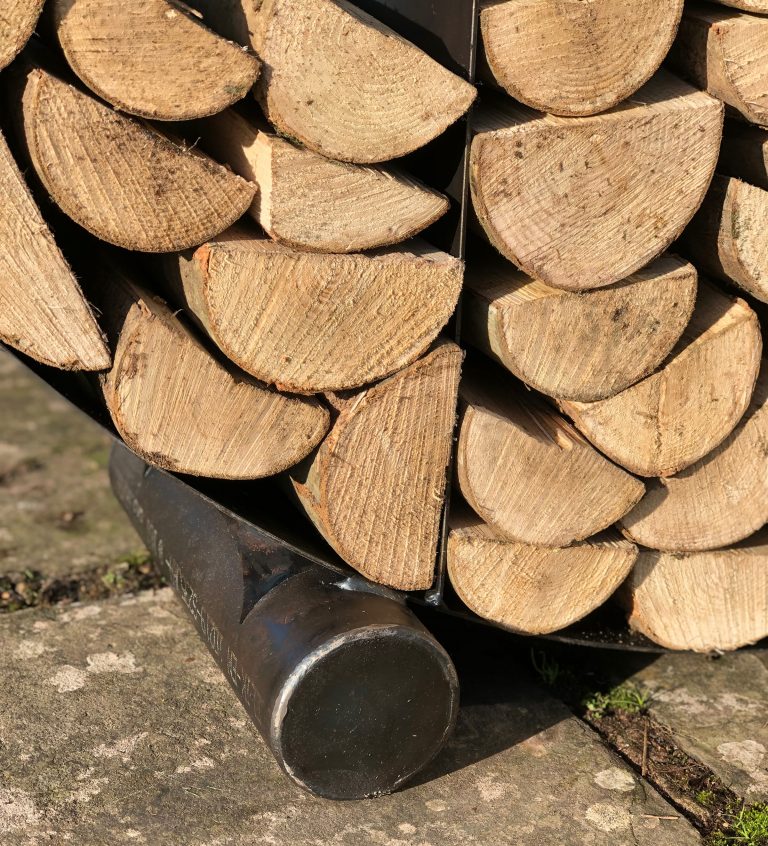 Close-up of the feet of the half circular log store