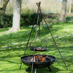 Long Leg tripod standing over a fire pit with a skillet of pancakes