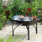 Fire pit shelf hung on a Plain Jane fire pit beside the swing arm rack