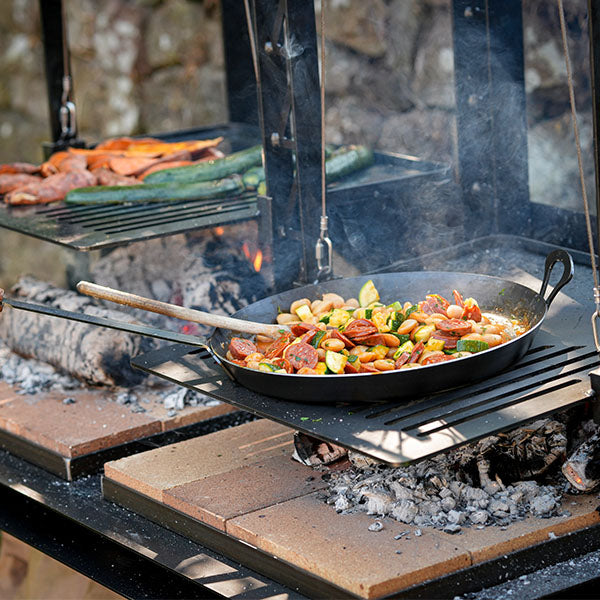 Firepits UK 34cm long handled pan with beans and chorizo over a fire