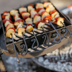 Chorizo and chicken kebabs on the kebab rack