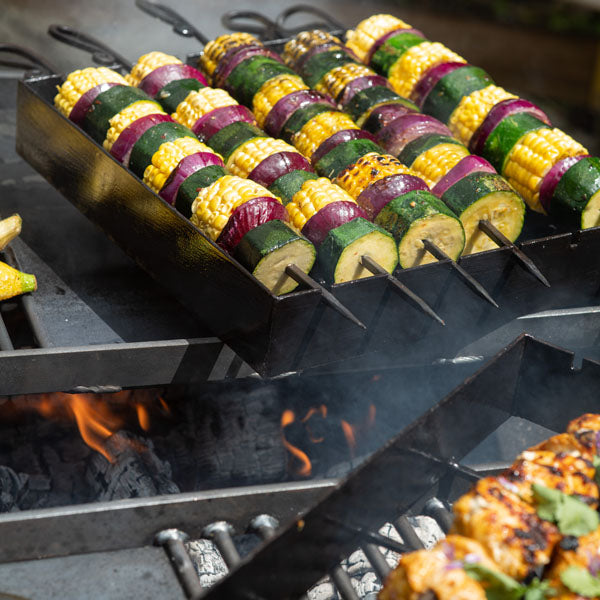 Vegetable kebabs on the kebab rack