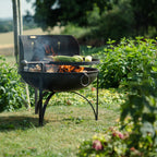 Wind shield in place with a swing arm BBQ rack