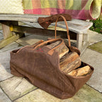 Log carrier bag with logs and fire pit gloves