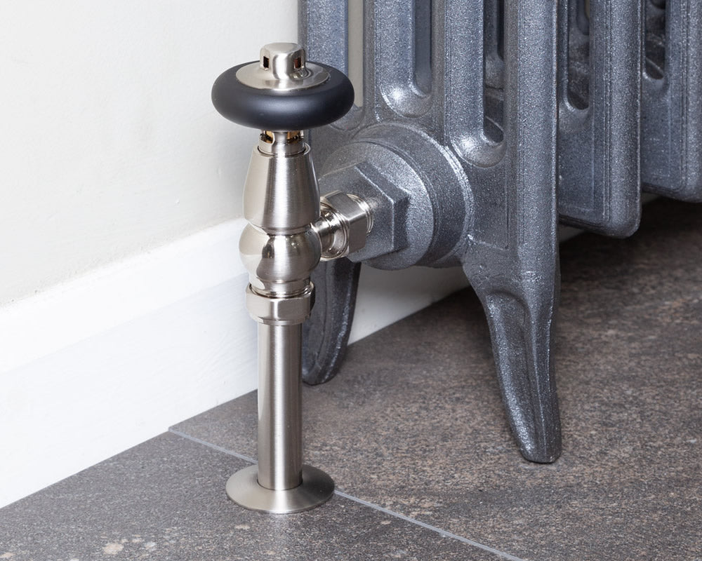 Carron Kingsgrove angled thermostatic valve in satin nickel installed on a radiator