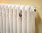 Carron Liberty 1 Column cast iron radiator, Farrow and Ball wimborne white close up