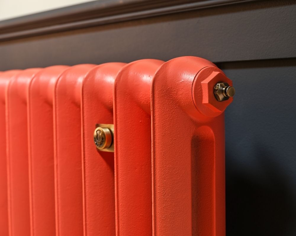Carron Princess cast iron radiator, Farrow and Ball bisque close up