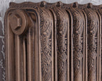 Carron Ribbon 4 Column cast iron radiator, antiqued hammered gold top