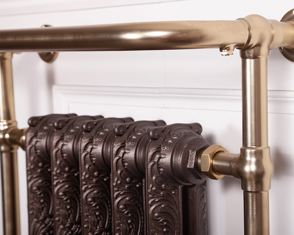 Carron Wilsford towel rail in brushed brass with painted cast iron sections, detail